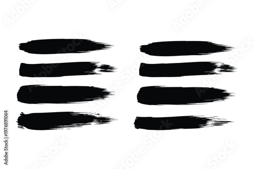 Abstract arrangement of bold black brushstrokes on a clean white background creating a dynamic pattern