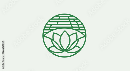A green lotus flower logo sits atop a brick wall background.
