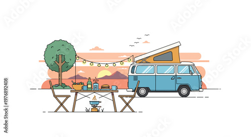 Vintage blue camper van parked beside a wooden picnic table with food and drinks illuminated by string lights under a scenic mountain sunset horizon view.