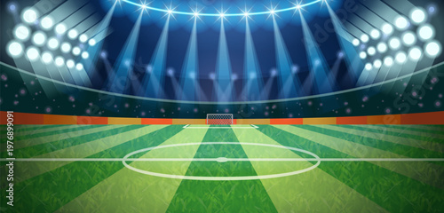 Foto High-energy indoor football arena with bright spotlights and a lush green pitch
