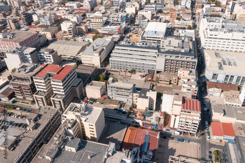 Aerial view of Athens city with dense urban buildings and streets in Greece
