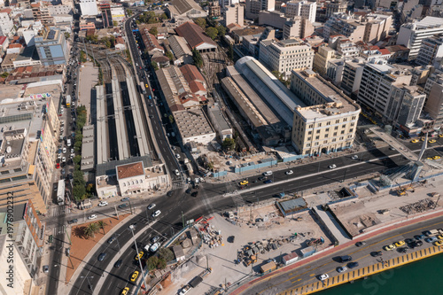 Aerial view of Piraeus port with terminal building, docks and water in Athens, Greece
