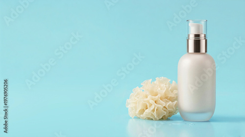 Hydrating snow mushroom skincare fluid banner with blank pump bottle and tremella ingredient on blue background. For beauty ads, web banners, cosmetic branding and spa promotions.