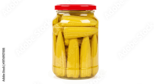 A jar of pickled vegetables sits on a table indoors
