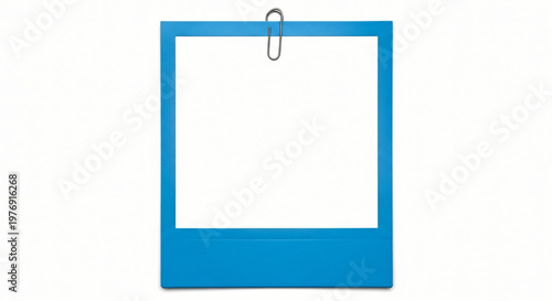 Blank note paper with a metal paperclip on an empty stationery sheet provides a professional business memo pad for an office message or reminder notice