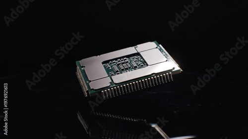 Floating Microchip Processor Rotating on Reflective Surface Over Dark Background for Technology Concept