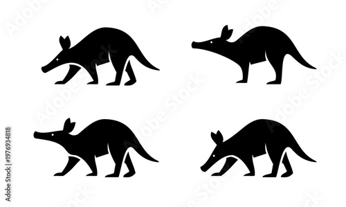 Aardvark Logo and Icon Set. Black Silhouettes of Aardvarks in Various Poses on a White Background.