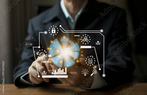 Businessman using laptop with virtual data analytics dashboard, business intelligence, data visualization, and digital technology concept with futuristic interface