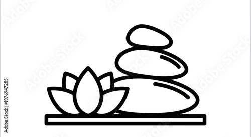 Photography Zen stones and a lotus flower are arranged in a balanced stack to represent relaxation, meditation, and spiritual wellness