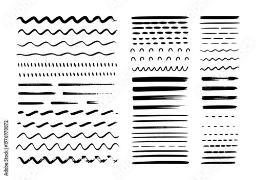 Collection of black hand-drawn brush strokes, lines, and wavy patterns white