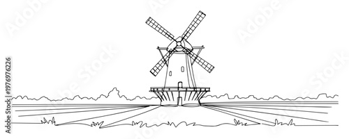 traditional windmill in dutch countryside black and white