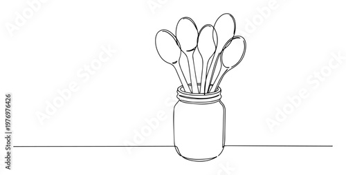 Foto spoons in a glass jar utensil holder continuous one line drawing