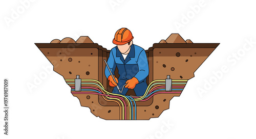 An expert technician wearing a protective orange hard hat and blue work clothes installs a complex series of colorful underground utility cables in a trench.