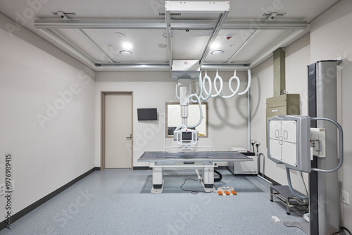 Modern x ray or fluoroscopy procedure room in hospital interior