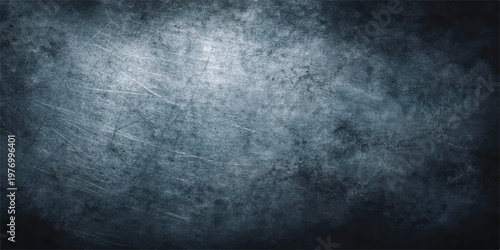 Close up abstract textured background with detailed scratches and grunge effects in shades of deep blue and grey for industrial design elements