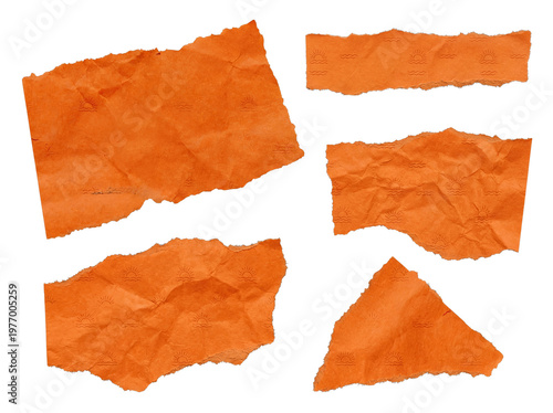 Assorted torn and crumpled vibrant orange paper fragments featuring a subtle wave and sun pattern.