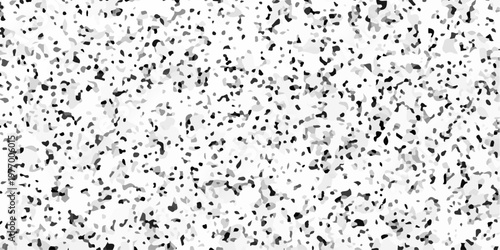 Black and white terrazzo texture seamless pattern with dark stone chips on light marble. A densely speckled abstract texture with varying shades of gray and black against a white background