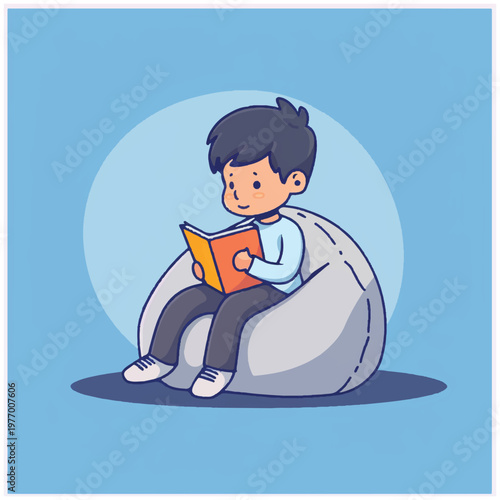 Boy sitting on bean bag reading 1.