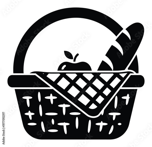 Picnic basket filled with fresh apple and baguette, ready for outdoor dining and leisurely summer activities perfect for food related projects and lifestyle promotions.