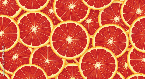 Vibrant and colorful pattern made of overlapping slices of fresh red grapefruit showcasing the juicy citrus texture and seeds.