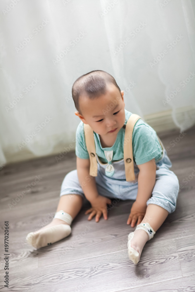 Fototapeta premium Cute Asian boy indoors