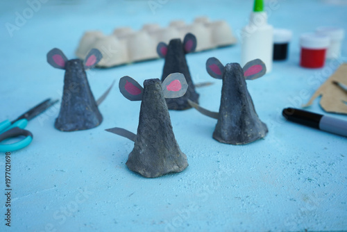 A simple DIY childrens craft is a family of mice made from cardboard egg packaging. Step 5 Insert ears and tails into the slots