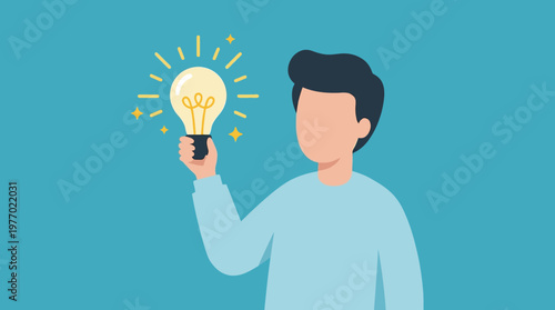 Man holding a glowing lightbulb with a creative idea