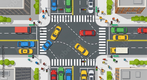 Aerial View of a Busy City Intersection with Cars and Pedestrians.