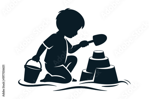 A silhouette of a child building sandcastles on the beach