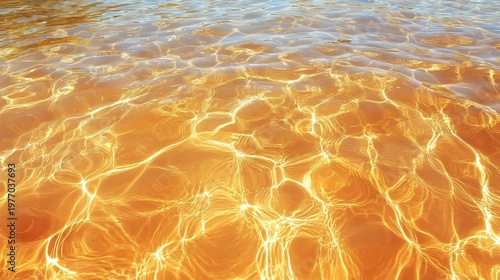 Dynamic Underwater Light Patterns Creating Artistic Effects on Sand with Reflections and Warm Colors