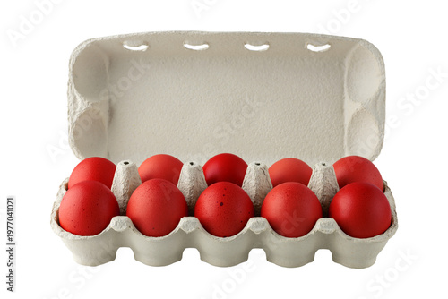Cardboard carton box with fresh painted in red chicken eggs isolated on white. Packaging products for market. Happy Easter eggs.