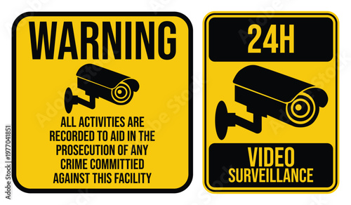 Two yellow warning signs depict security cameras and associated text regarding video surveillance rendered as a silhouette high quality professional detailed modern elegant