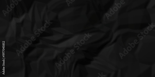 Crumple crushed black paper obsolete rumple craft design. wrinkle ripped creased crumple aged closeup recycled document grunge paper background.