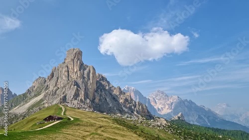 View of majestic Ra Gusela Peak of Nuvolau group at Giau Pass in the Dolomites Mountains, South Tyrol, Italy, in springtime, 4K timelapse