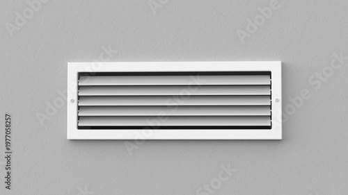 Square air vent mounted on a grey wall