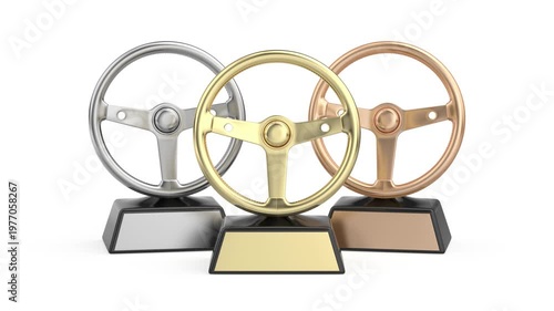Gold, silver and bronze steering wheel trophies on white background