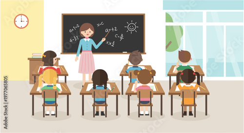 Teacher writing on blackboard in classroom with students sitting at desks in educational setting for school