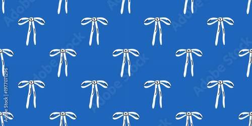 Vector royal seamless pattern with skinny white ribbon bow on bold royal blue background. Coquette repeat print for fashion fabric, gift wrapping paper, boy baby shower and modern digital wallpaper.