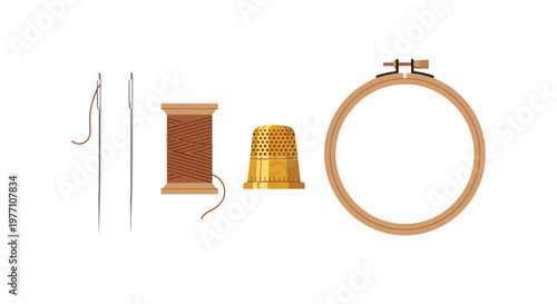 Essential embroidery tools including a rich brown thread spool and a gleaming golden thimble are arranged neatly beside a sturdy wooden circular frame.