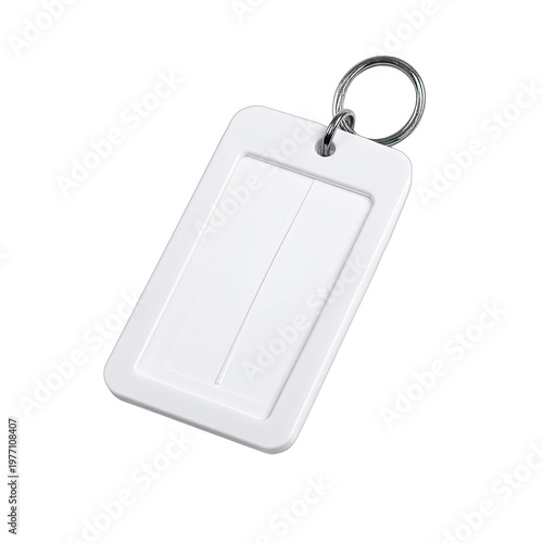 A blank white rectangular keychain tag with a metallic keyring against a stark black background.