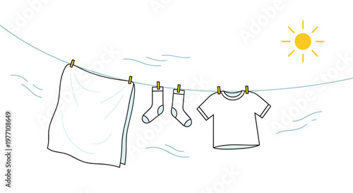 Fresh white laundry items including a large towel two socks and a t-shirt hang on a thin clothesline under a bright yellow sun during a windy summer day.