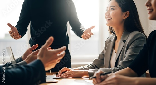 Diverse team collaborating in a modern office meeting.