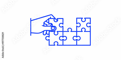 Hand fitting a puzzle piece into a partially completed jigsaw