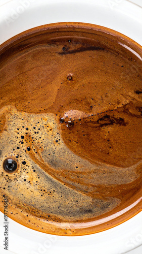 pouring coffee into a cup