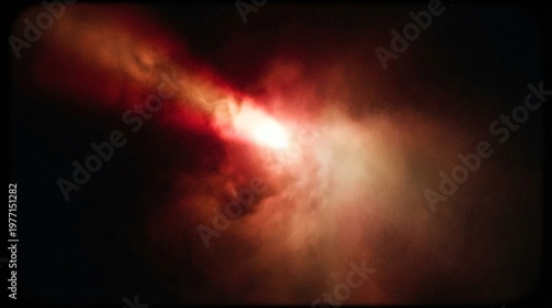 Red and orange fire smoke explosion light burst on dark background