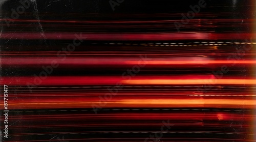 Multiple red horizontal light streaks motion blur on black background