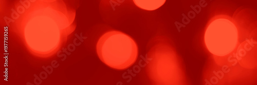 Blurred lights red background, banner texture. Abstract bokeh with soft light header. Wide screen wallpaper. Panoramic web banner with copy space for design