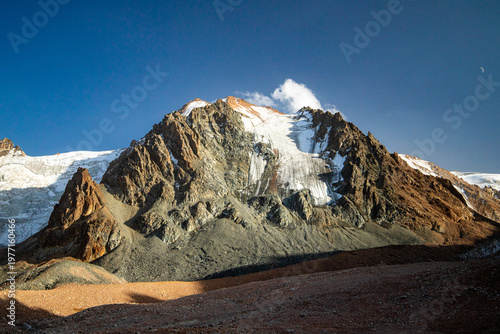 Majestic view of the sharp peaks rising above the Tashkent sites. A popular destination for mountain climbers and hikers.