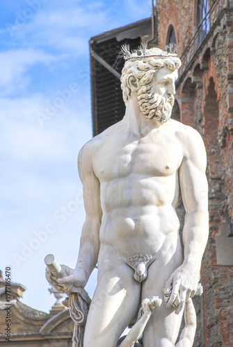 Detail of Neptunes statue from the Fountain in Piazza della Signoria in Florence, showcasing Renaissance marble mastery
