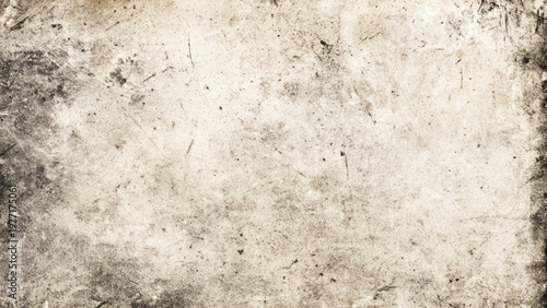 Grungy beige concrete wall with scratches and stains  rough textured surface
